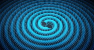 Las ondas gravitacionales son ondulaciones concéntricas que encojen y estiran la 'tela' del espacio-tiempo.