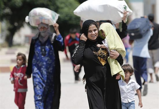 Veinte familias originarias de Mosul llegan al noreste de Siria